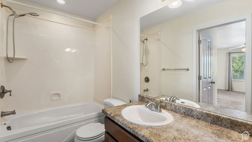 Bathroom featuring shower / bath combination and vanity