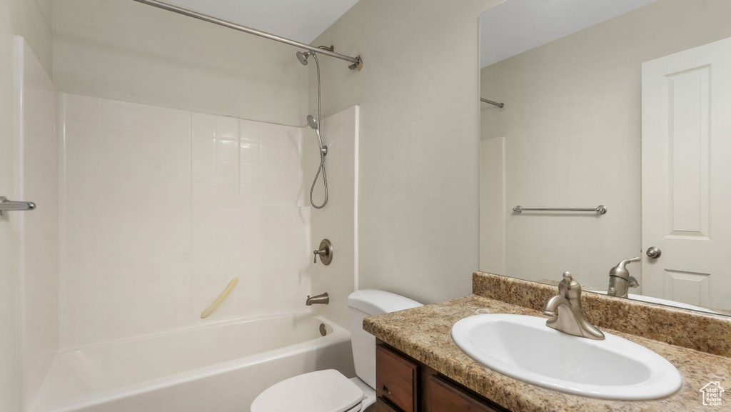 Bathroom featuring vanity and shower / bathtub combination
