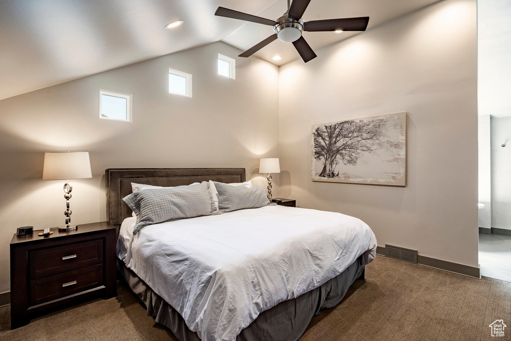 Carpeted bedroom with high vaulted ceiling, a ceiling fan, and recessed lighting