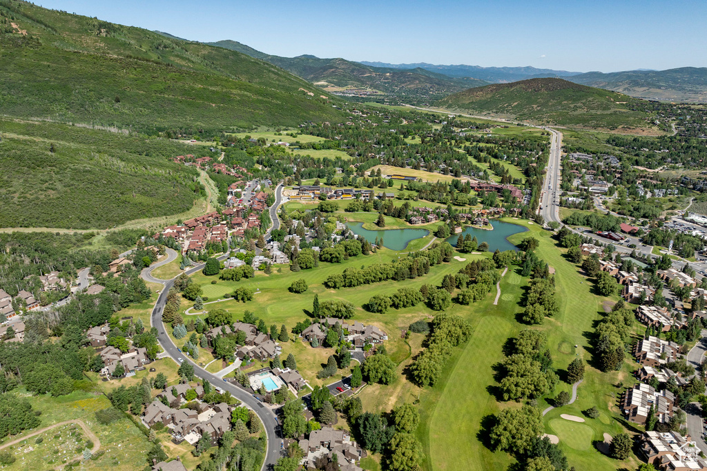 View of property location with a water and mountain view