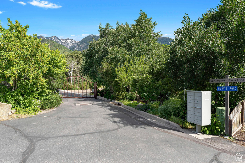View of street with a gate and a mountain view
