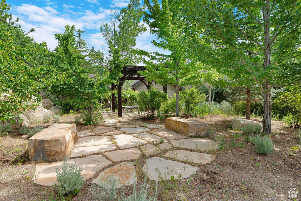 View of patio featuring a pergola