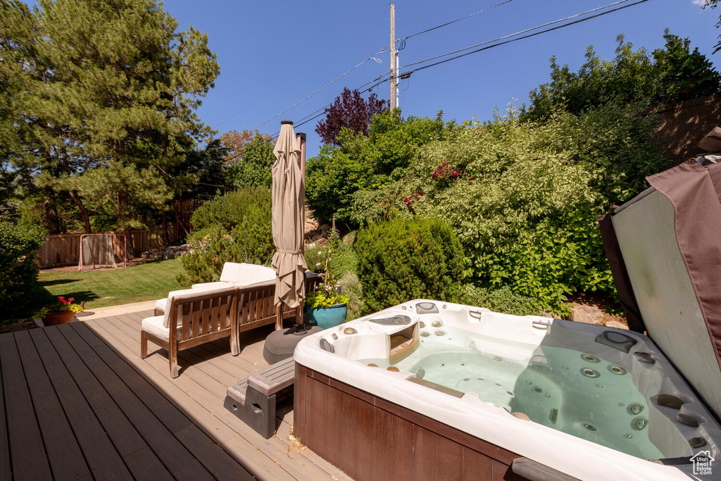 Deck featuring a hot tub