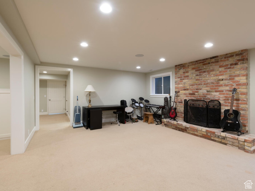 Office area featuring light colored carpet and recessed lighting