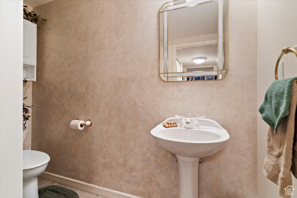Half bathroom featuring toilet