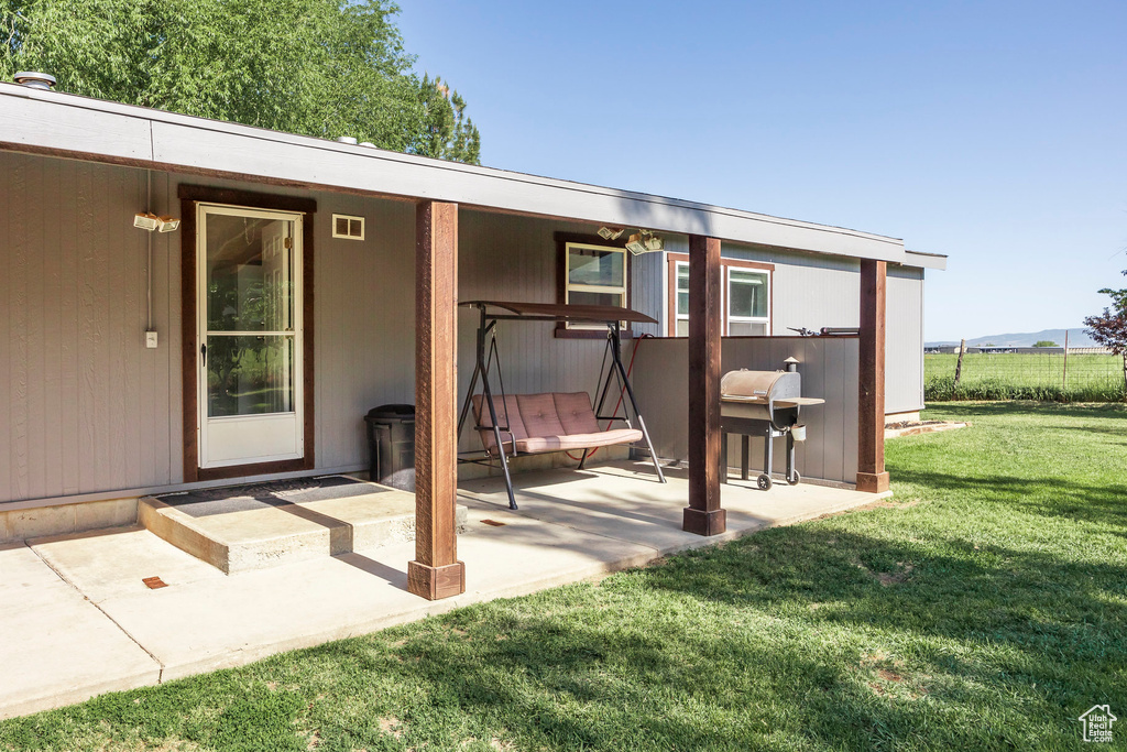 View of patio with area for grilling