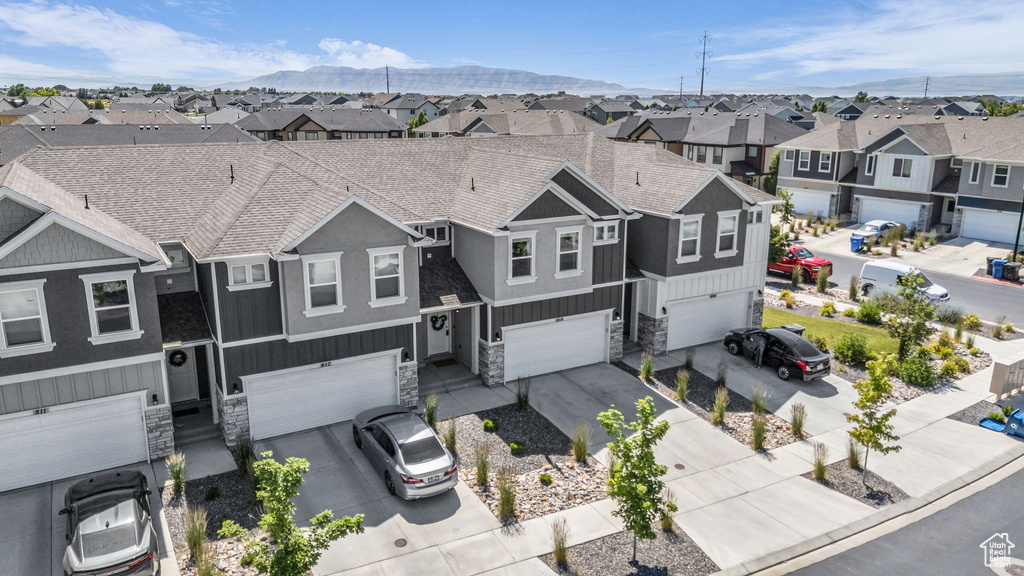 Aerial view of residential area with mountains