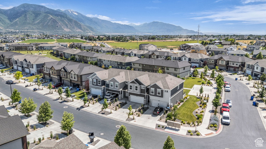 Aerial view of residential area with a mountainous background