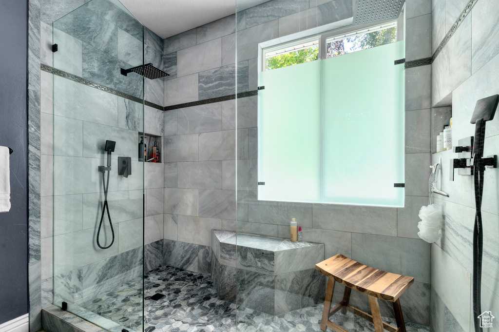 Bathroom featuring a walk in shower