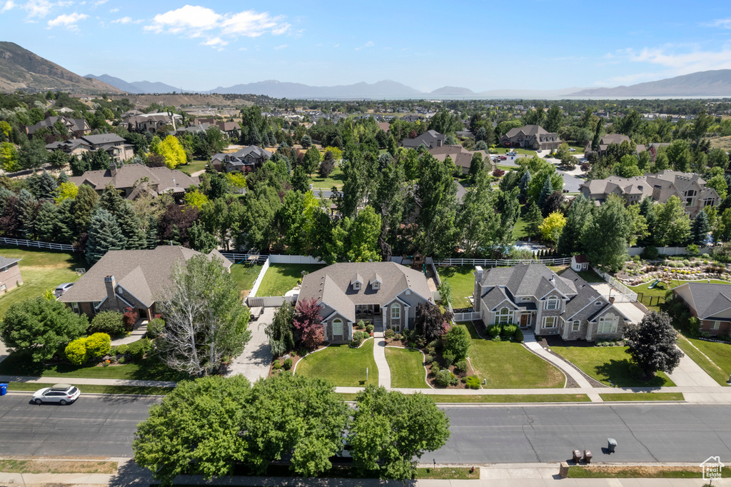 Aerial view of residential area featuring mountains