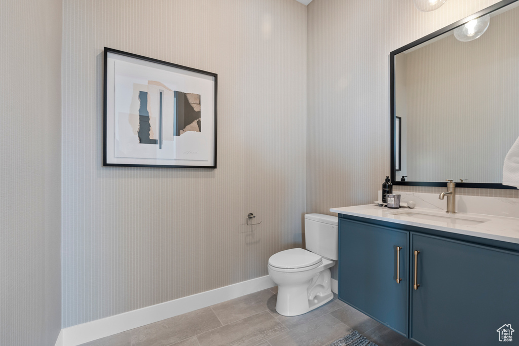 Bathroom with baseboards and vanity