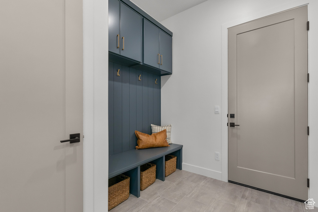 Mudroom featuring baseboards