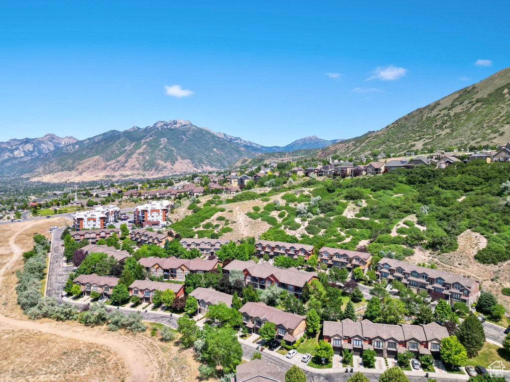 View of mountain background featuring nearby suburban area