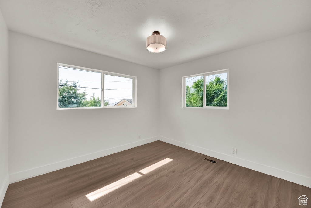 Empty room with wood finished floors