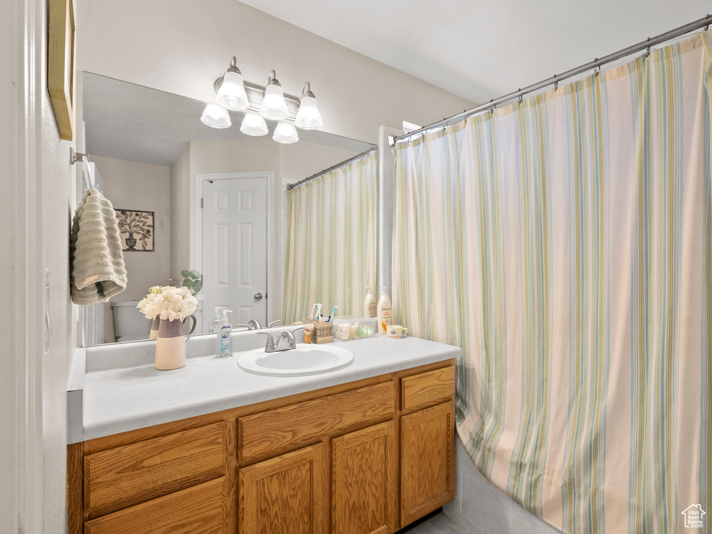 Full bathroom featuring vanity