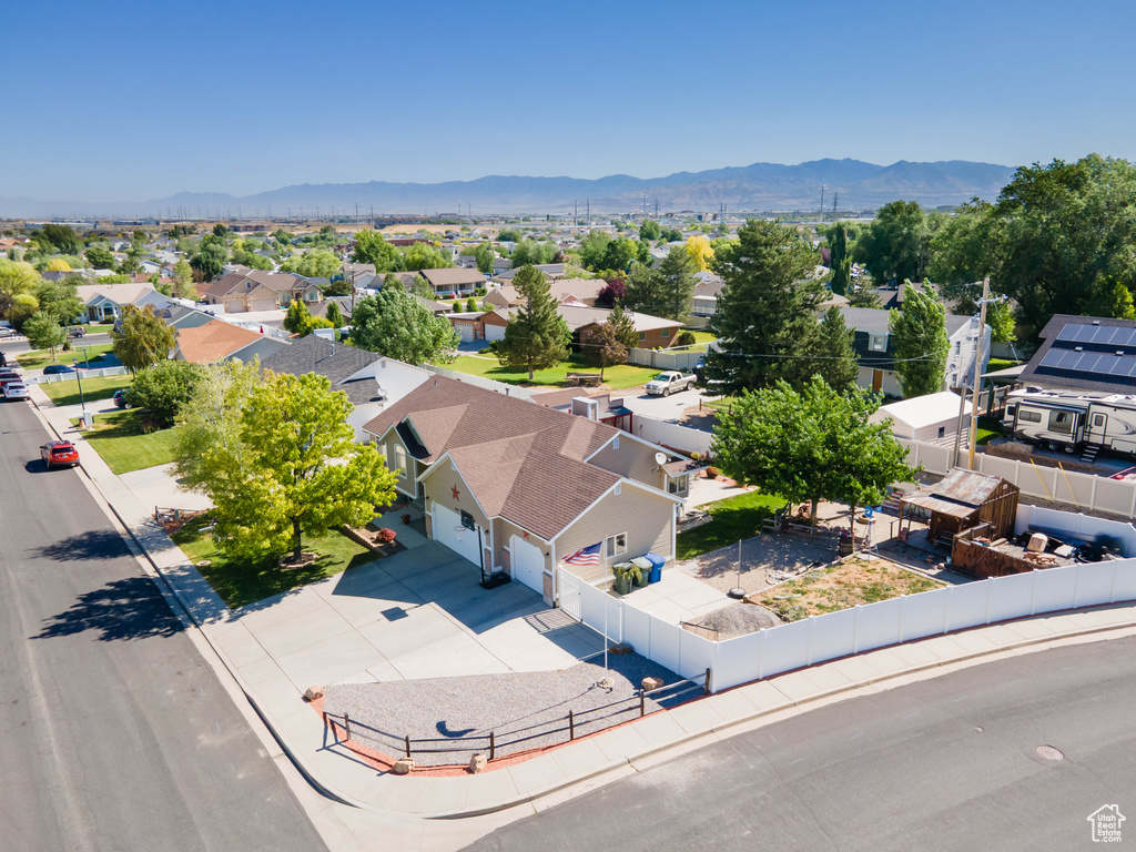 Aerial perspective of suburban area with mountains