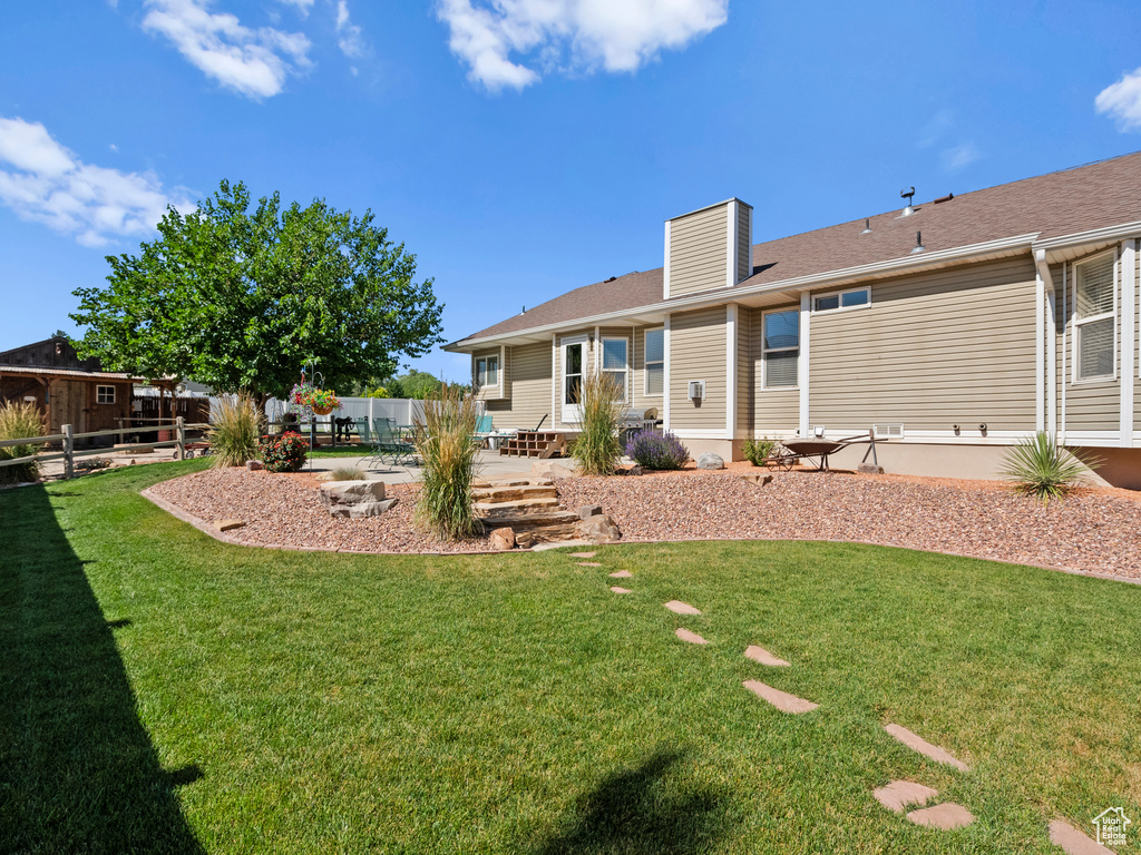 View of yard with a patio area