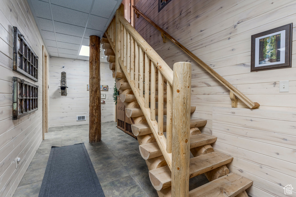 Stairs with wood walls
