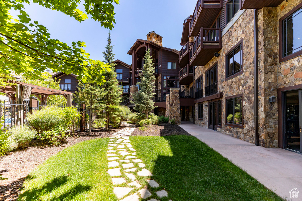 Surrounding community featuring a lawn