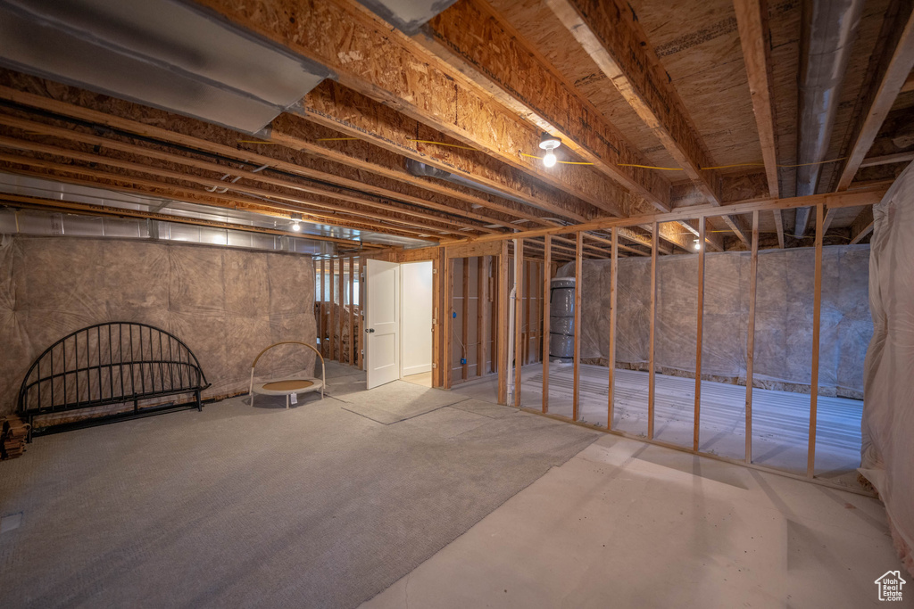 Unfinished basement with water heater
