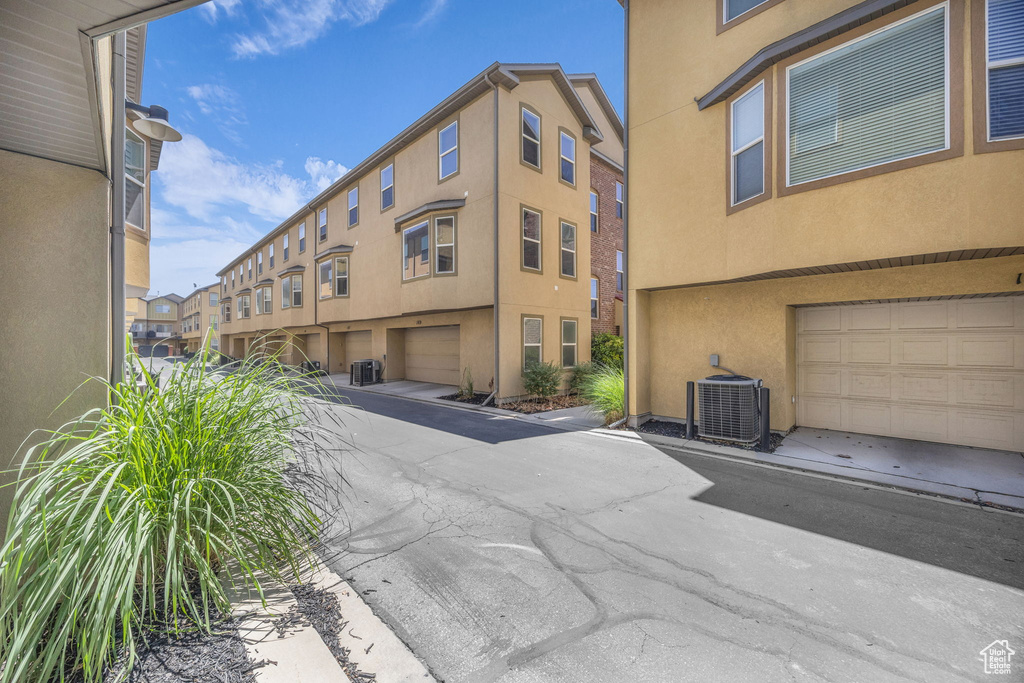 View of property with an attached garage
