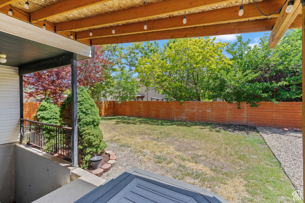 View of fenced backyard