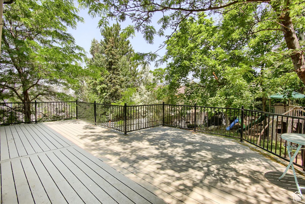 Deck featuring a playground