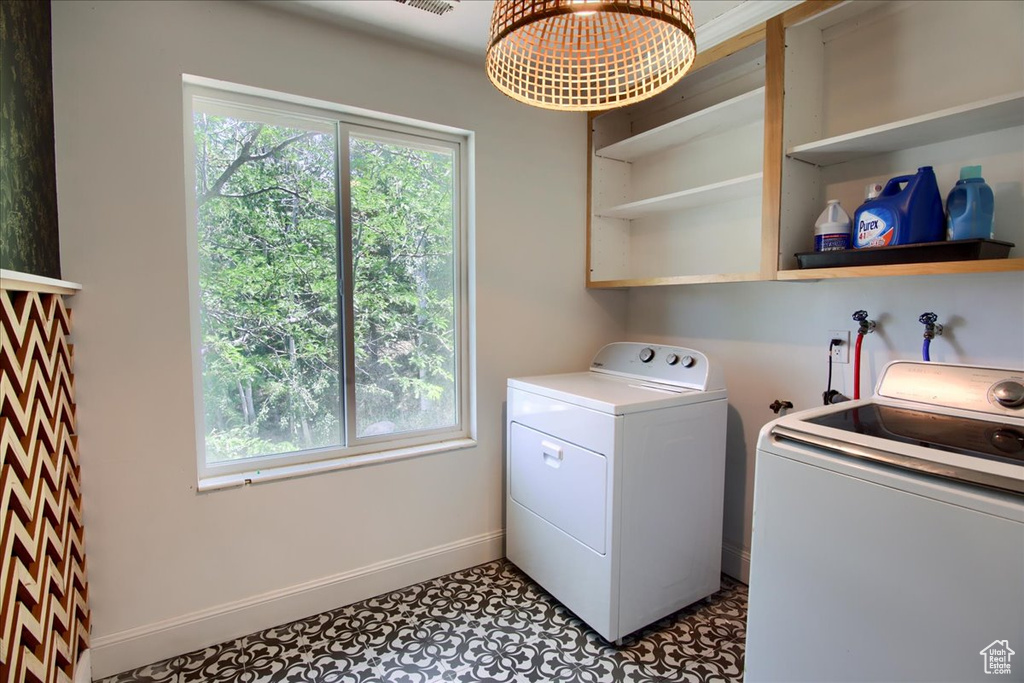 Laundry room featuring washing machine and dryer