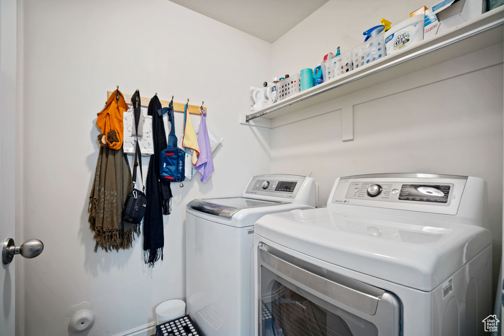 Laundry area featuring washer and clothes dryer