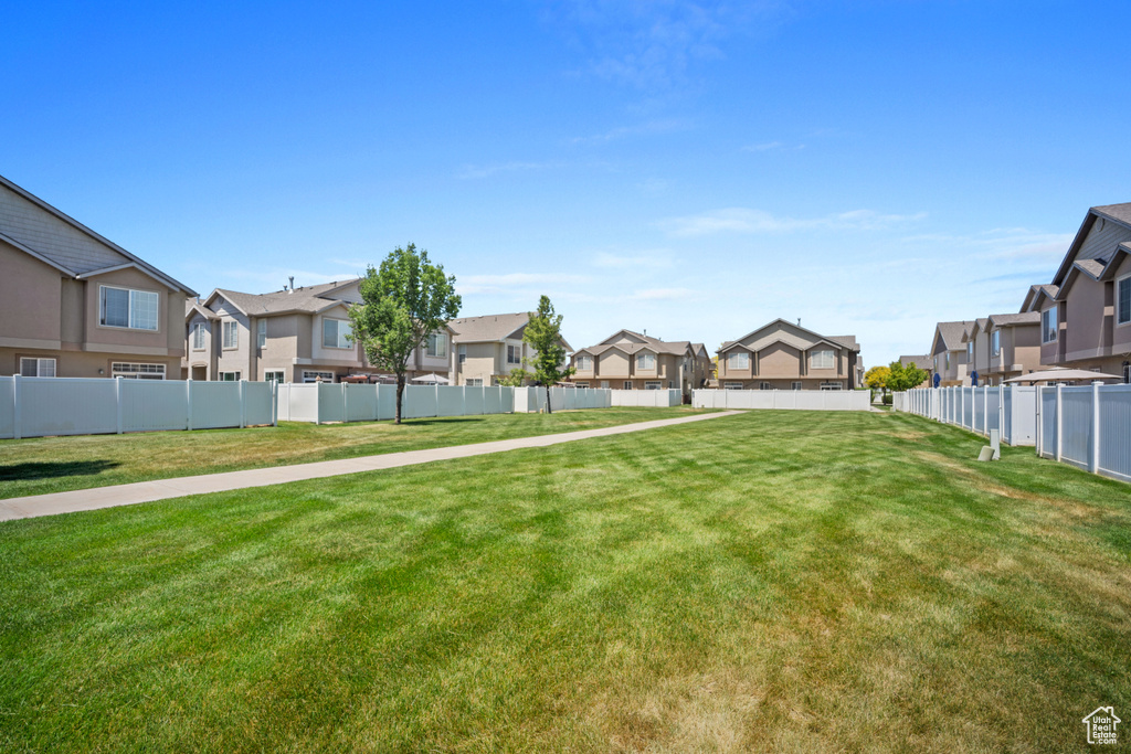 View of yard with a residential view
