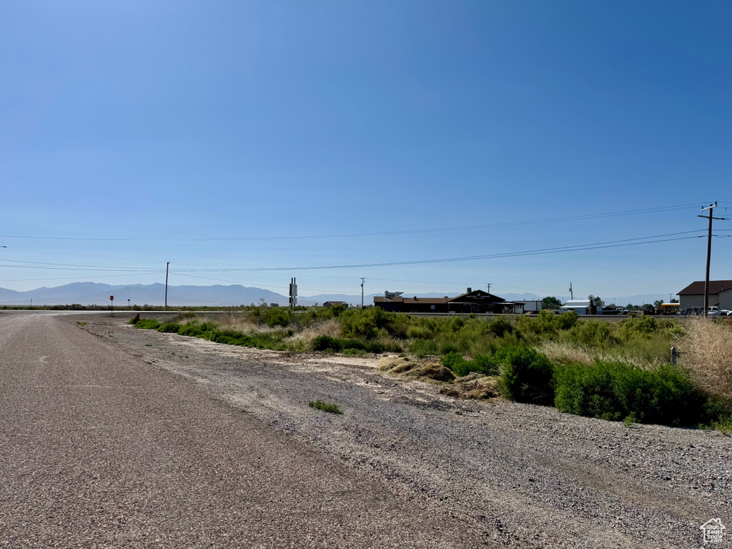 View of asphalt road featuring a mountain view
