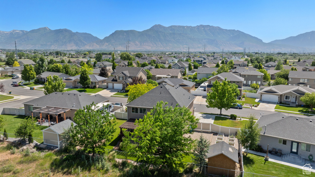 Aerial perspective of suburban area with mountains