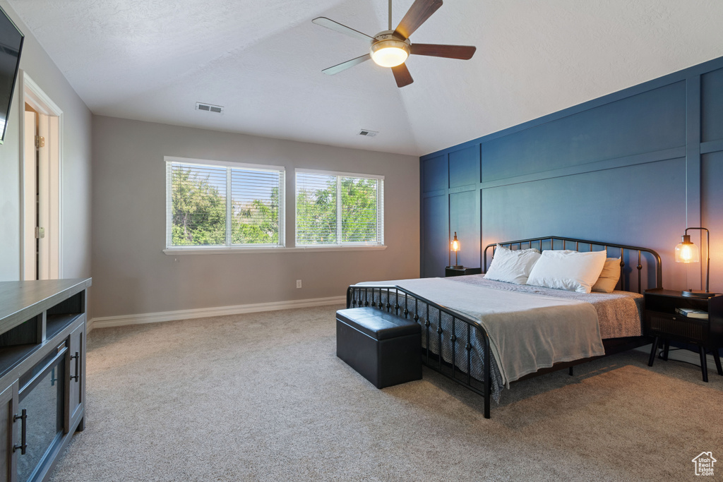 Bedroom featuring carpet flooring and a ceiling fan
