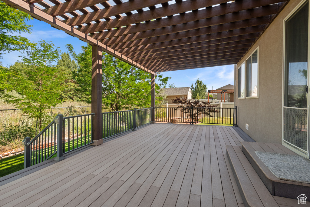 Deck featuring a pergola