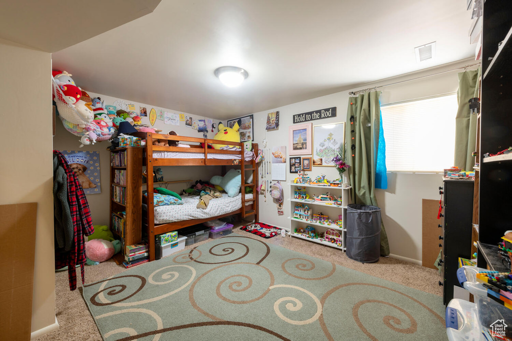 Bedroom featuring carpet flooring