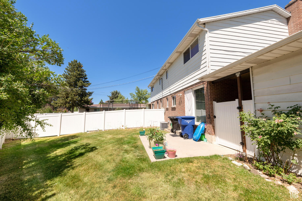 View of yard with a patio area