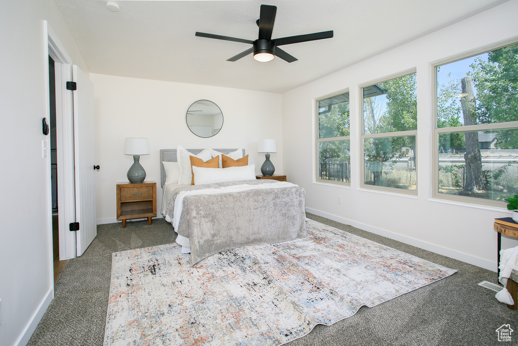 Bedroom with carpet floors and ceiling fan