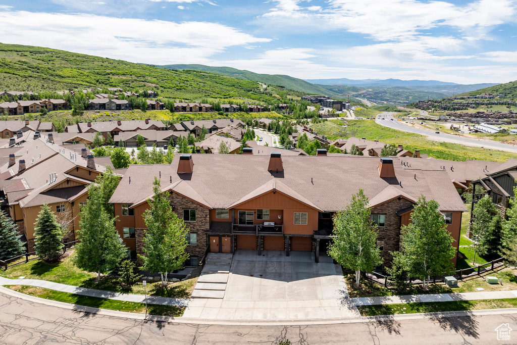 Aerial perspective of suburban area featuring mountains