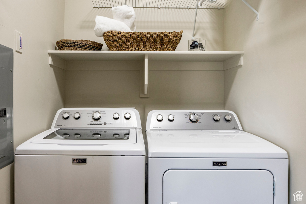 Laundry room featuring washer and clothes dryer