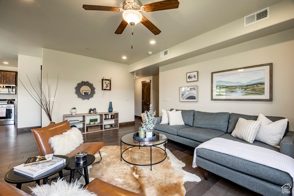 Living area featuring recessed lighting, wood finished floors, and ceiling fan