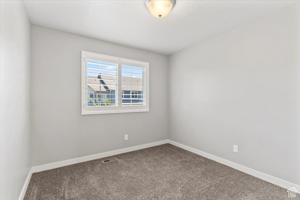 Spare room with carpet