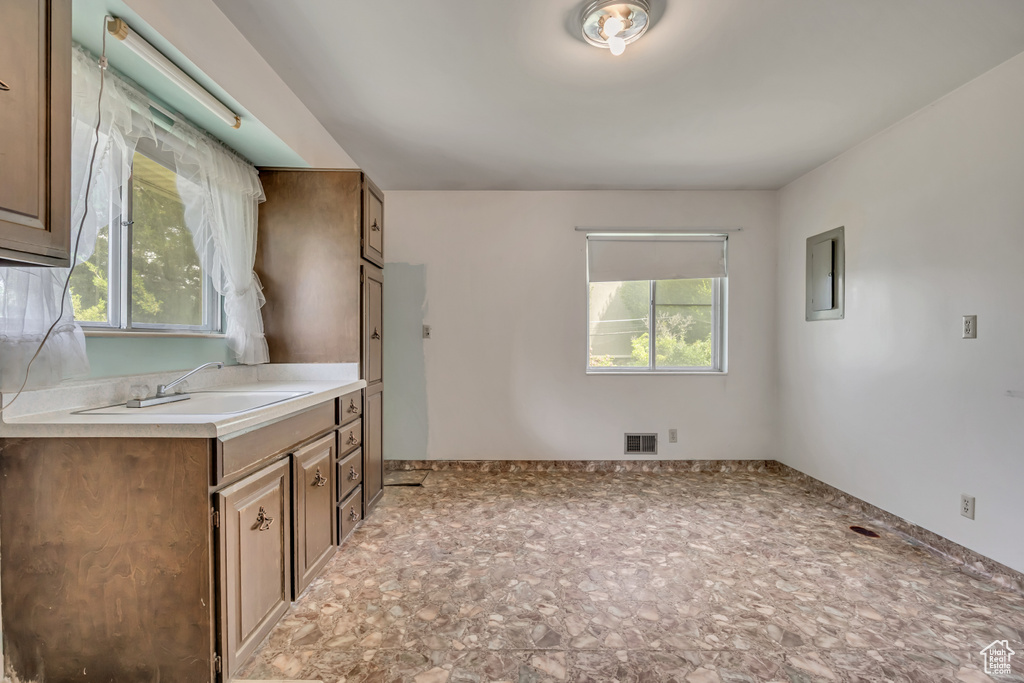 Bathroom with stone finish flooring and vanity