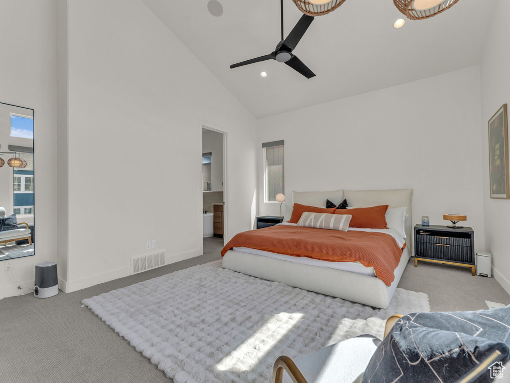 Carpeted bedroom featuring high vaulted ceiling, recessed lighting, and ceiling fan