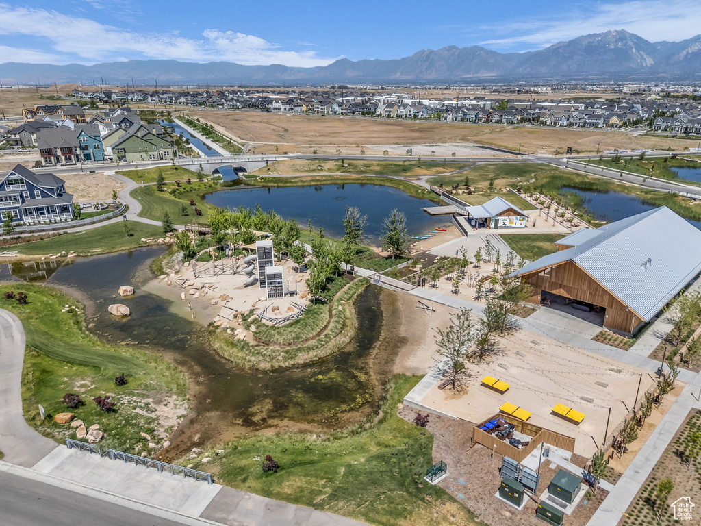 Aerial view of residential area featuring a water and mountain view