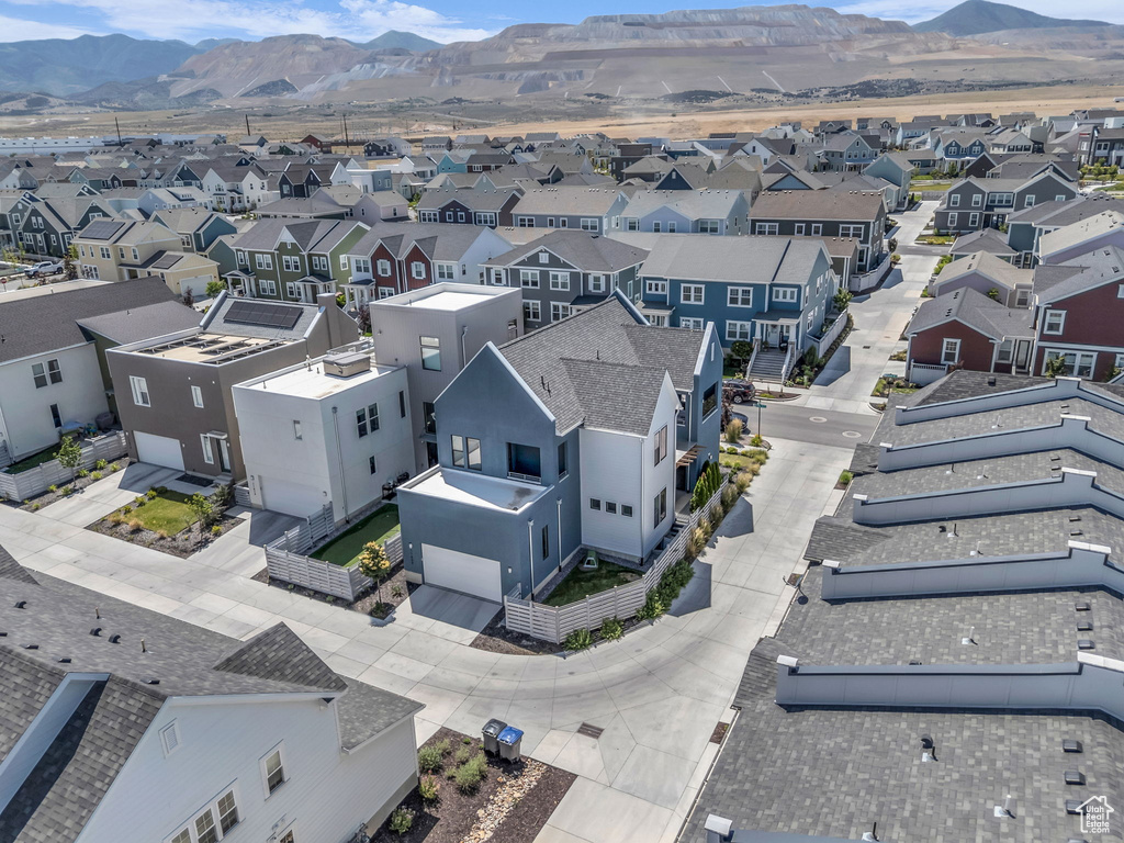Aerial view of residential area with a mountainous background
