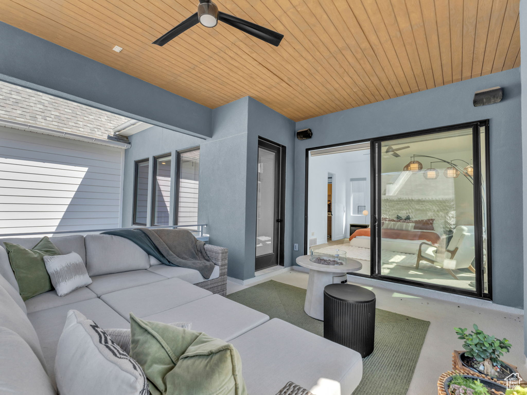 View of patio / terrace with an outdoor hangout area and a ceiling fan
