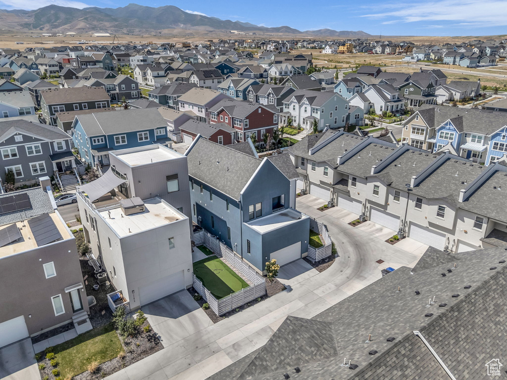 Aerial perspective of suburban area with mountains