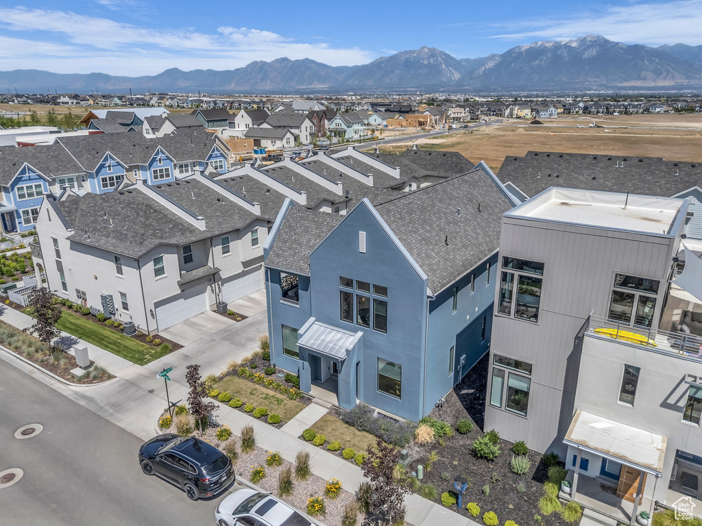 Aerial perspective of suburban area featuring mountains