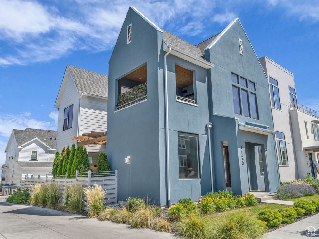 View of home's exterior featuring stucco siding