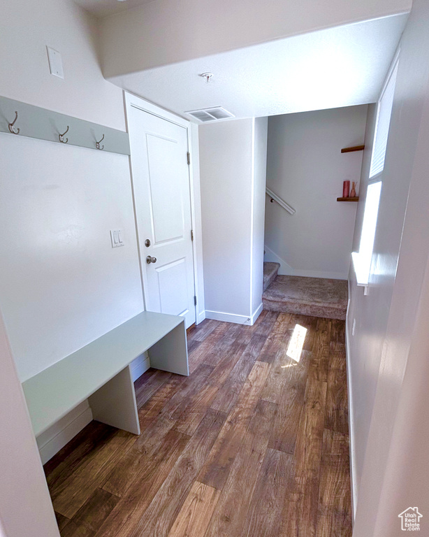 Mudroom with wood finished floors